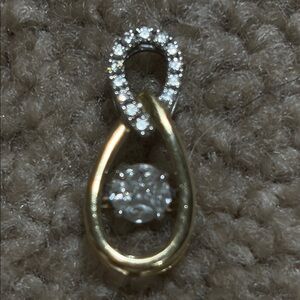 Kay Jewelers Gold pendent. It’s 14 kt.